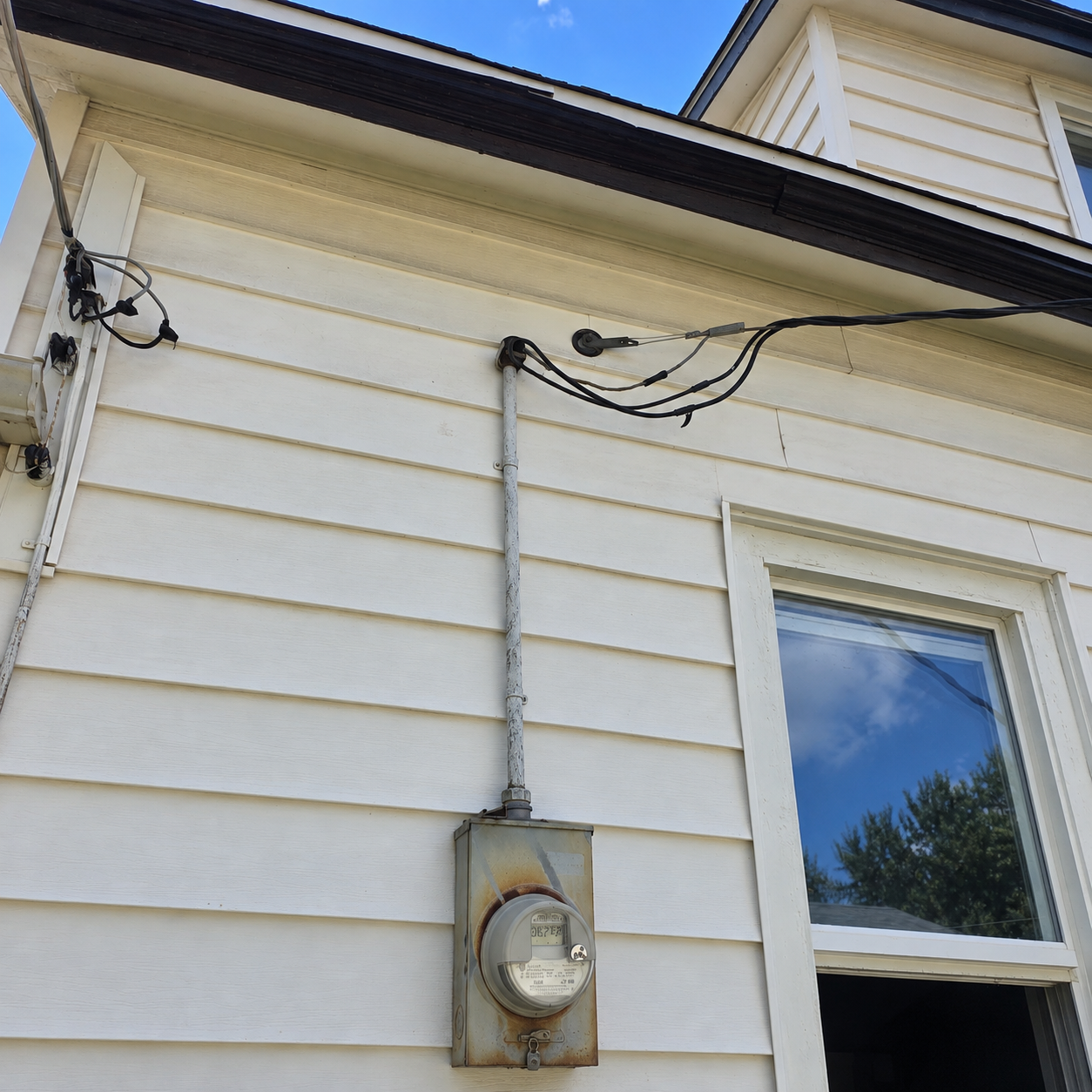 Electrical service equipment before an upgrade.