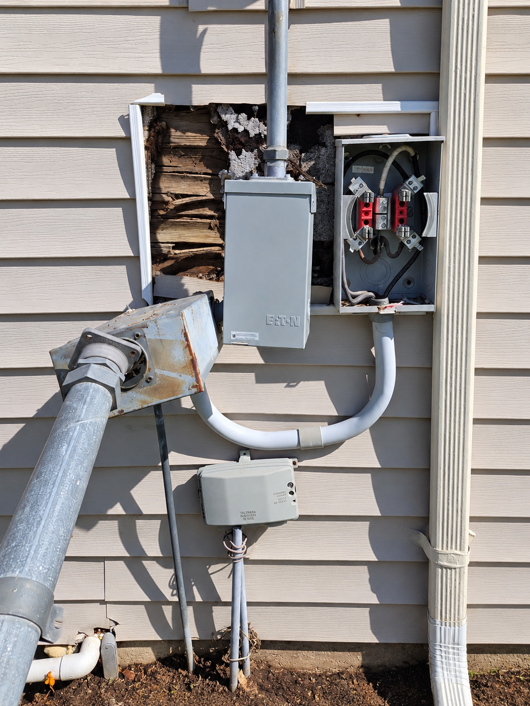 Electrical service equipment before improvements.